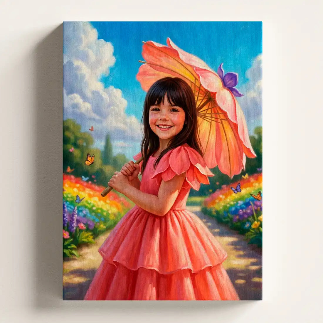A vertical canvas wall art print depicting a young girl in a pink dress holding a large flower parasol, set against a colorful garden path under a blue sky. The canvas is shown hanging on a light beige wall.