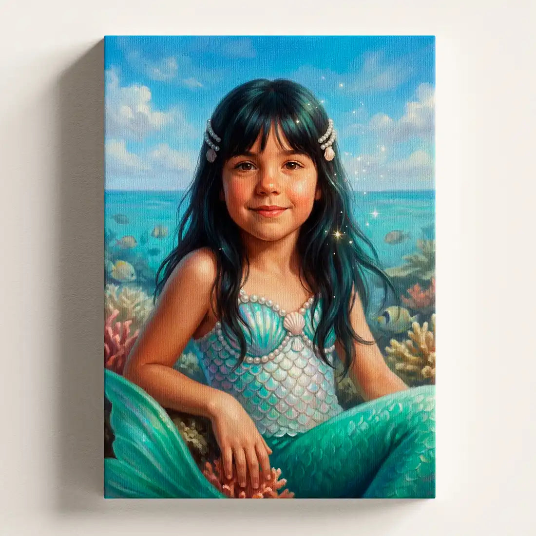 A custom canvas wall art print featuring a painted portrait of a young girl with dark hair as a mermaid, sitting on a coral reef with a blue ocean and sky background.